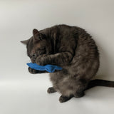 Cat biting cat fish toy
